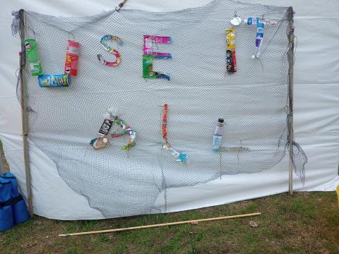 Use It All Banner made from recyclable things