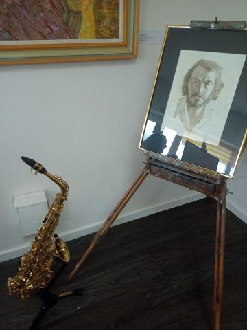 John Reay self-portrait and saxaphone